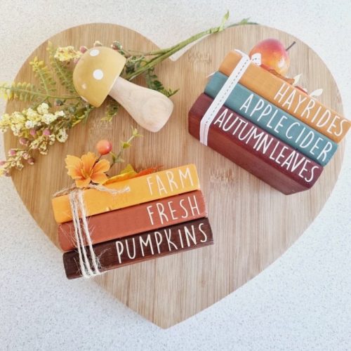 Wooden Farmhouse Book Stack Pumpkins Hayrides Autumn Leaves